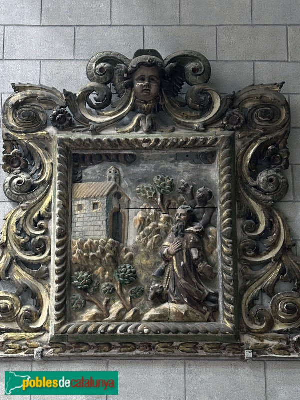 Cassà de la Selva - Església de Sant Martí. Plafó barroc a la capella de Sant Antoni (Foto: Albert Esteves, 2025) Cassà de la Selva - Església de Sant Martí. Plafó barroc a la capella de Sant Antoni