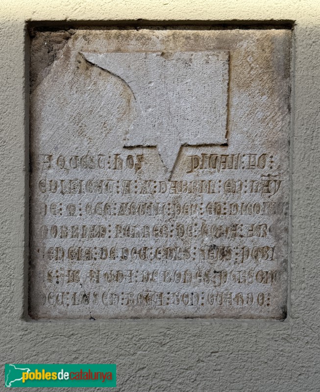 Medinyà - Antic Camí Ral. Inscripció de l'antic hospital de Sant Jaume